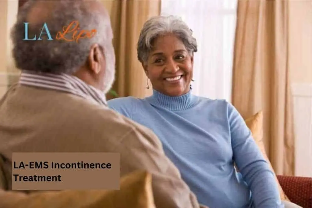 Couple sat smiling at each other - LA-EMS treatment Greater London (Hackney)