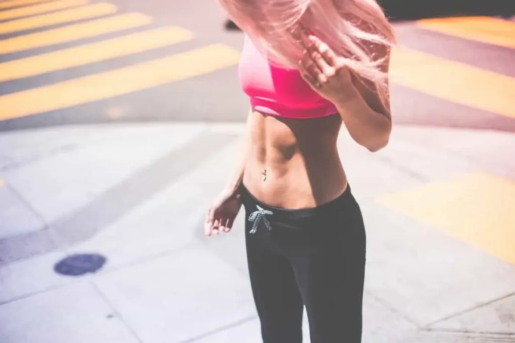 Woman with toned stomach after LA-EMS Body Sculpting Treatment Greater London (Hackney)